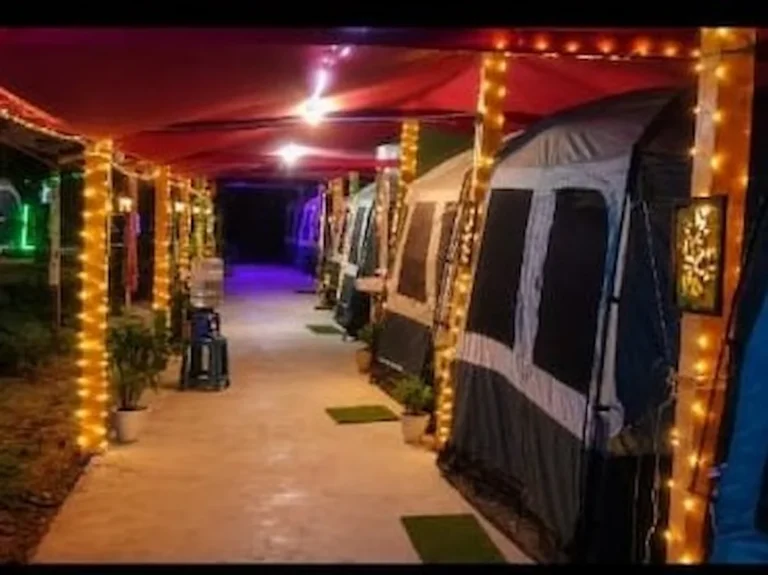 Guest & Rest, Bagda Sea Beach illuminated at night