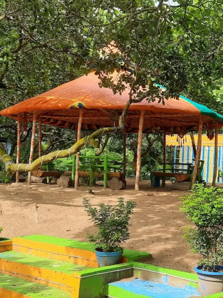 Outdoor seating area at Guest & Rest, Bagda Sea Beach